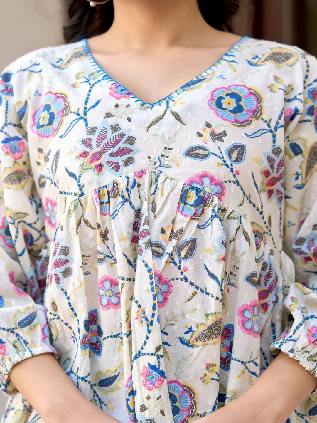 Off-White Printed V-Neck Peplum Tunic - Image 2