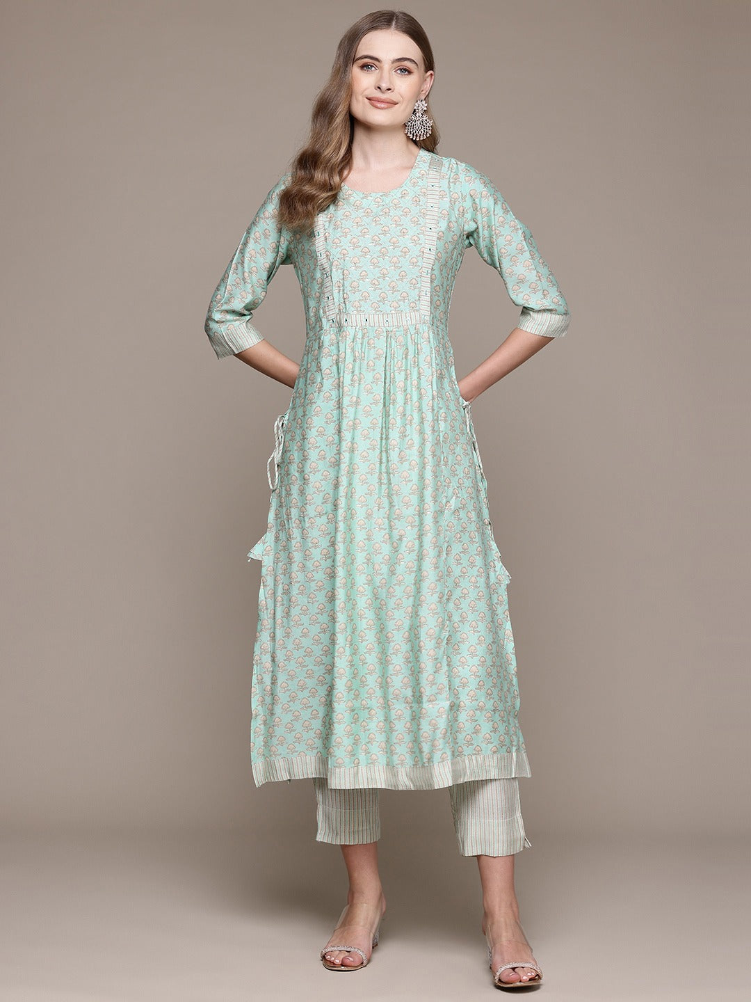 Flared Style Silk Fabric Green Color Kurta With Bottom