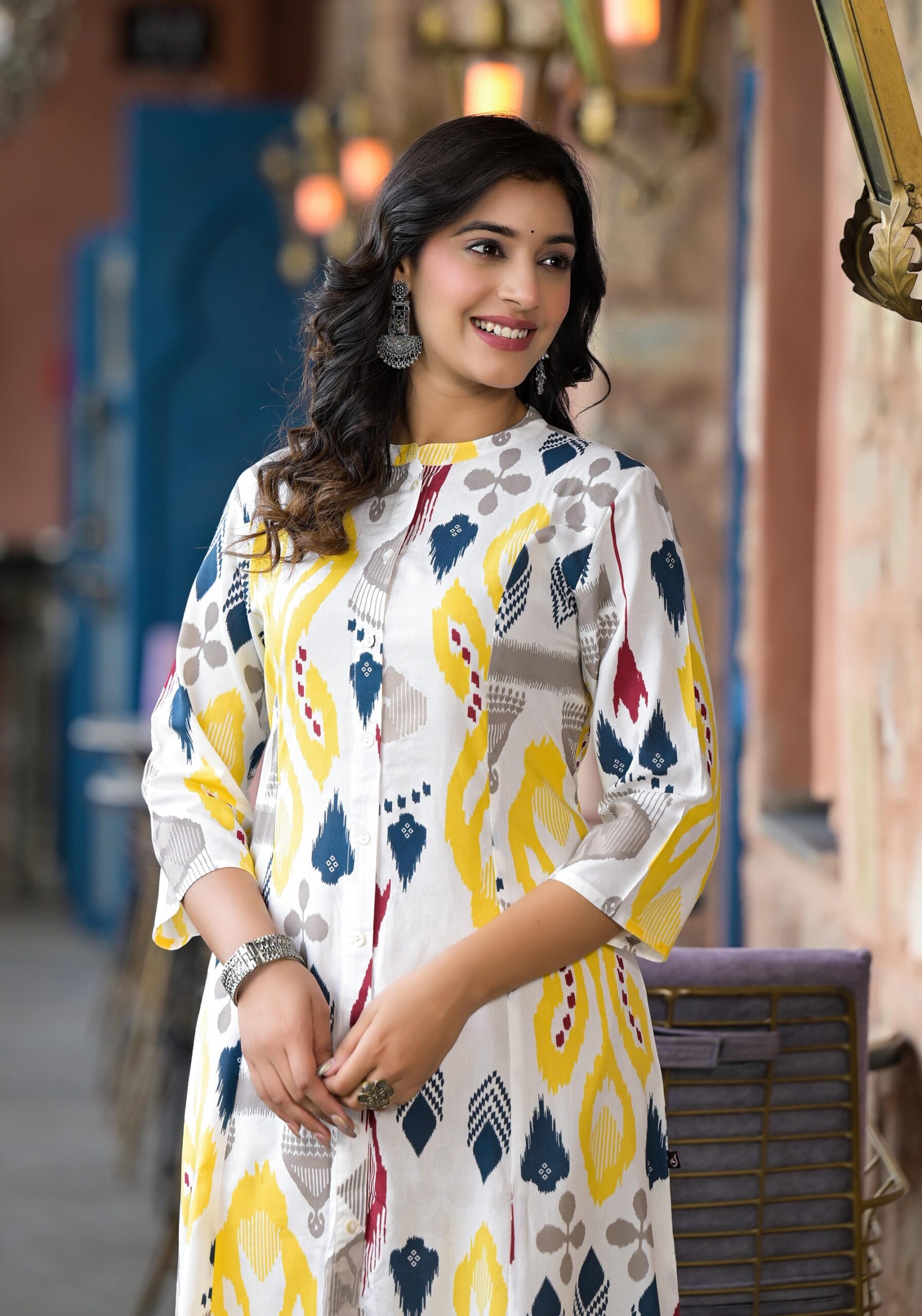 Yellow Ikat Printed Liva Rayon Women Kurta With Button Closure - Image 3
